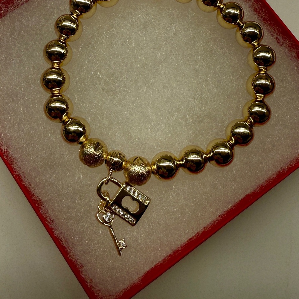 Elegant Gold Plated Beaded Bracelet with Lock and Key Charm